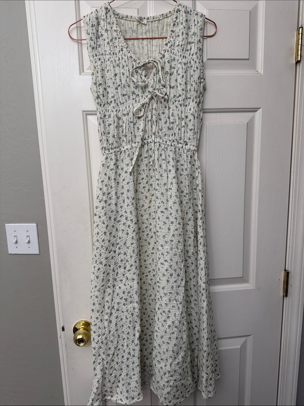 Sleeveless Cream Maxi Dress with Green Floral Print